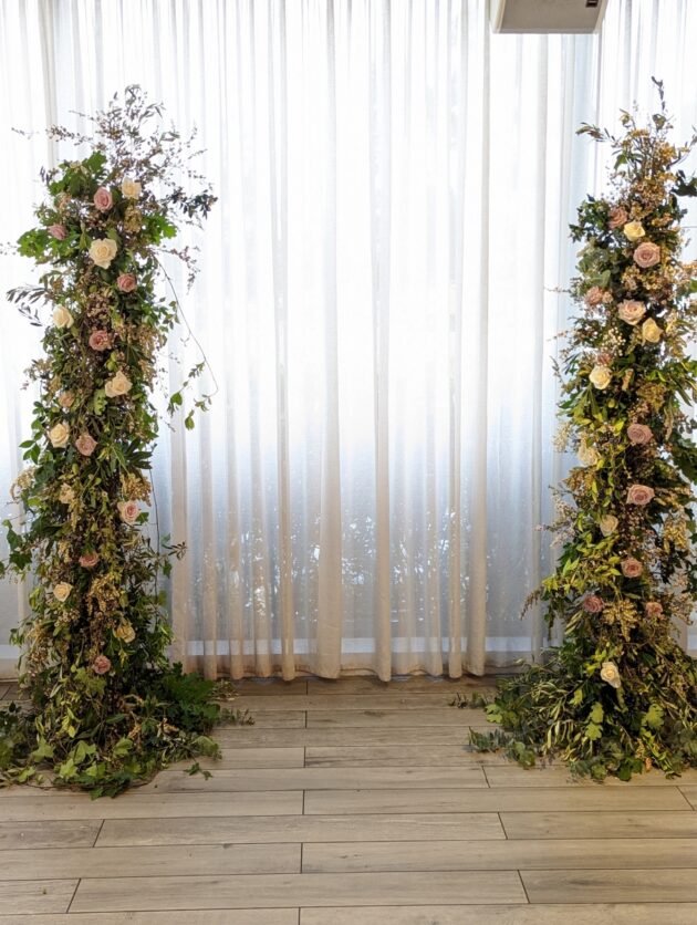 Tall pillars with flowers