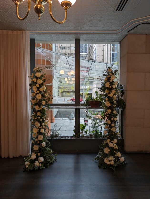 flower poles in a ceremony room