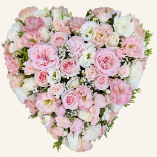 A soft pink heart tribute featuring two rose varieties with seasonal pink and white blooms.