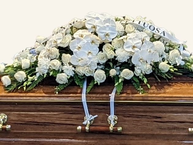 Elegant casket spray handcrafted by Belfield Blooms for a Sydney funeral service