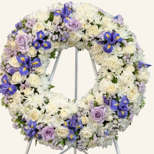 purple and white funeral wreath