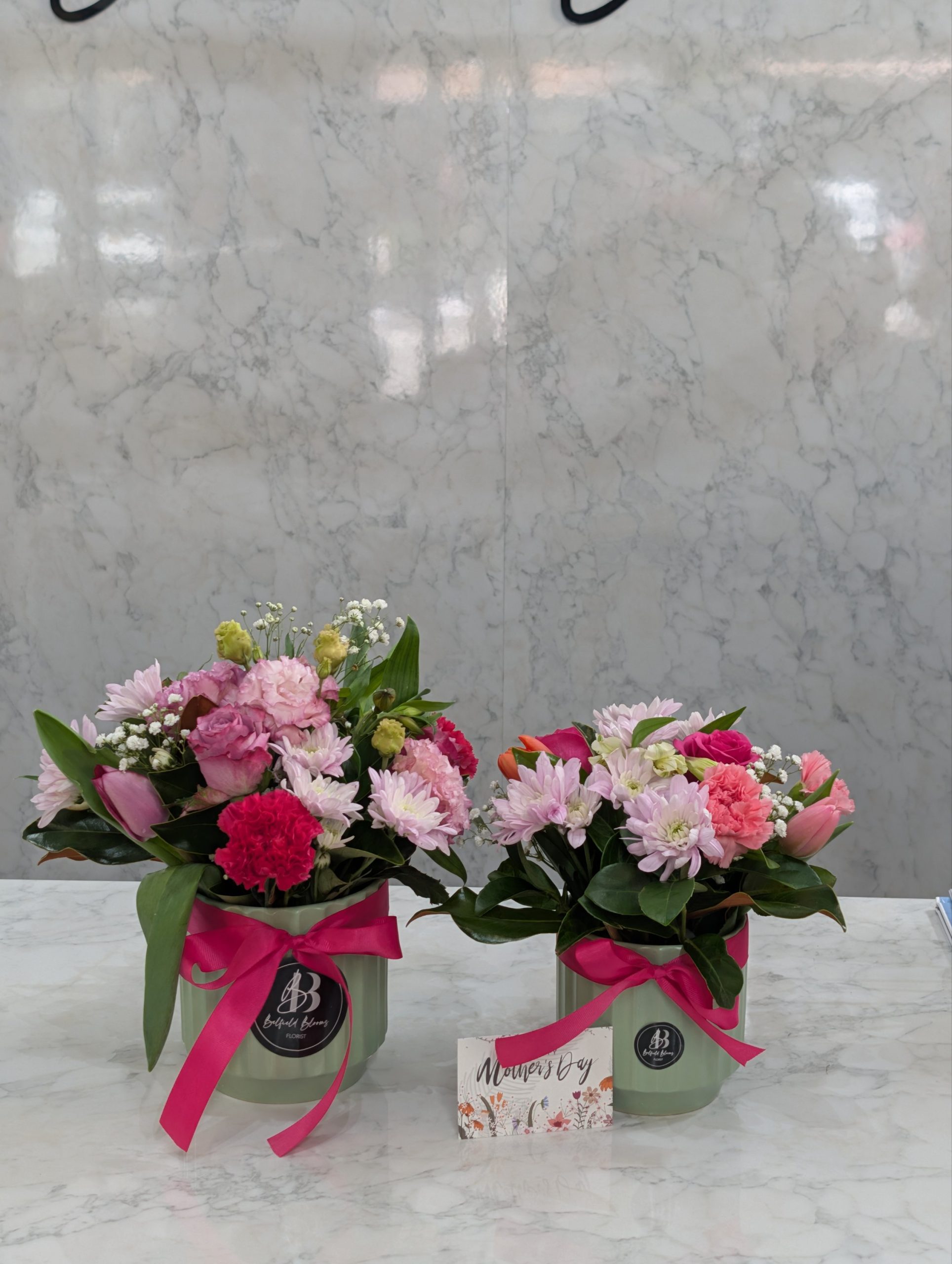 Ceramic vase flower arrangement with soft pastel blooms Sydney florist Belfield Blooms