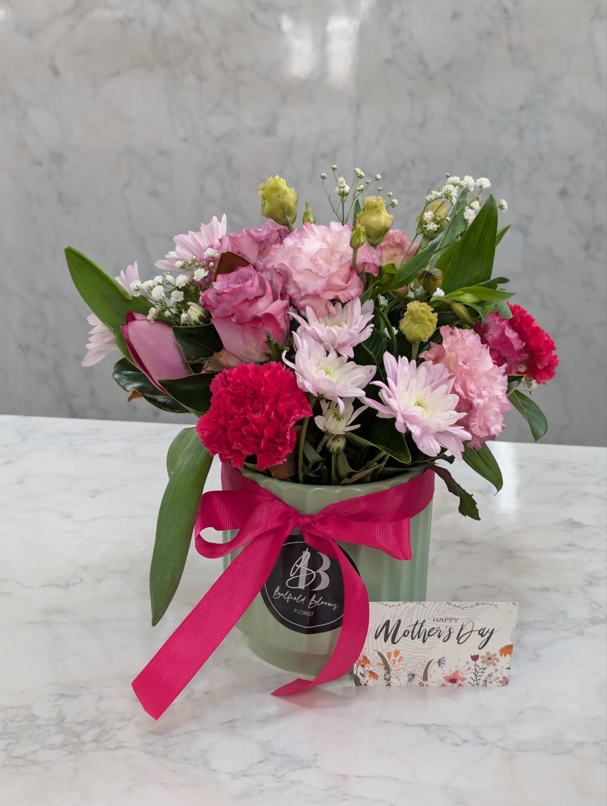 Ceramic vase flower arrangement with soft pastel blooms Sydney florist Belfield Blooms