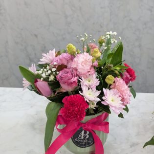 Ceramic vase flower arrangement with soft pastel blooms Sydney florist Belfield Blooms