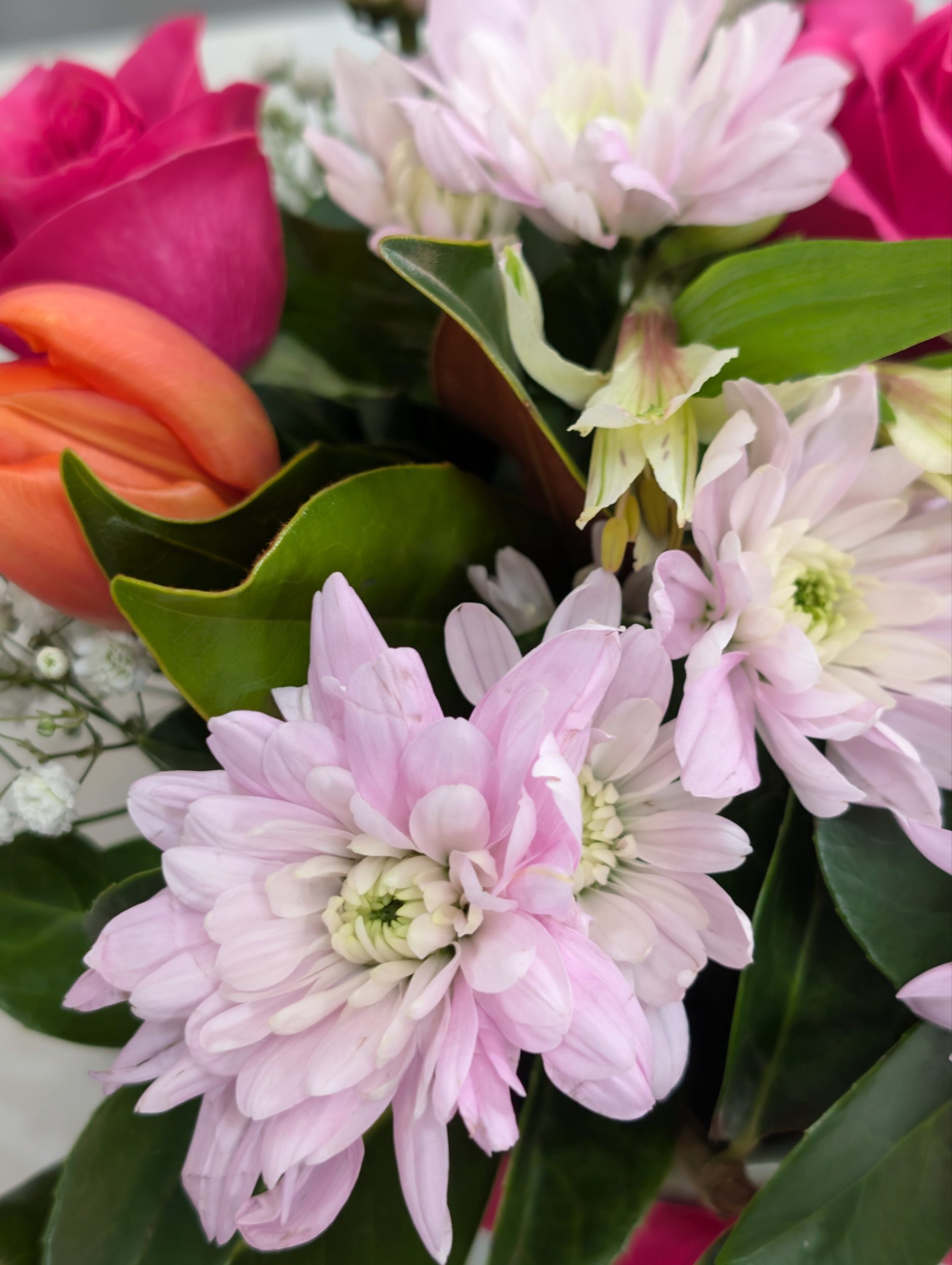 Ceramic vase flower arrangement with soft pastel blooms Sydney florist Belfield Blooms